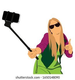 Girl take a self portrait with her smart phone, taking selfie - hand hold monopod with photo camera.