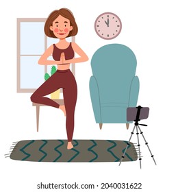 The girl takes online classes on the phone, does yoga. The concept of Stay at home.