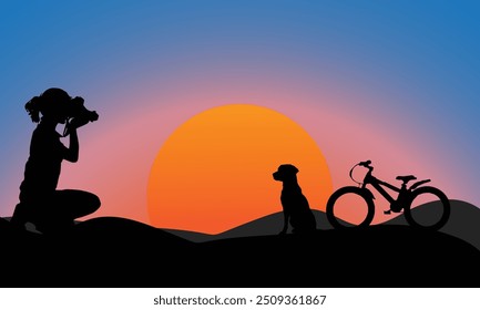 Das Mädchen macht bei Sonnenuntergang Fotos von ihrem Hund und ihrem Fahrrad