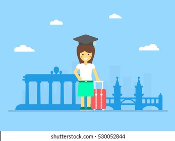 Girl tourist in Berlin. A student with a suitcase at the railway station. Silhouette of a city in Germany.