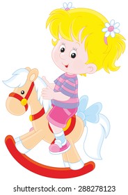 Girl and toy horse