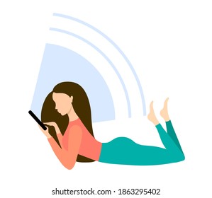 Girl using smartphone, lying. Young woman running freelance job. Communicate through social networks. Online shopping. Watching movie or reading