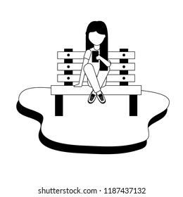 girl using smartphone sitting on bench park