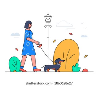 Girl walking a dog - modern flat design style illustration with line elements. A colorful composition with a smiling young woman in the park with her cute dachshund pet. Images of a lantern and bush