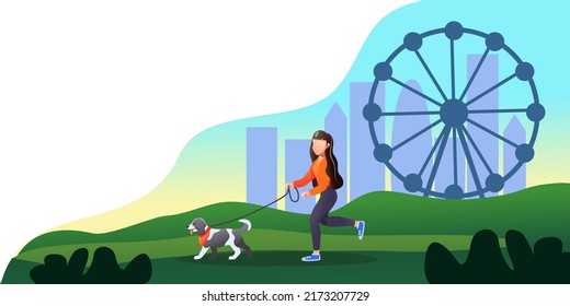 Girl walking with a dog in the park