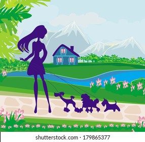 girl walking the dogs 