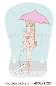 Girl walking with her dogs in rain