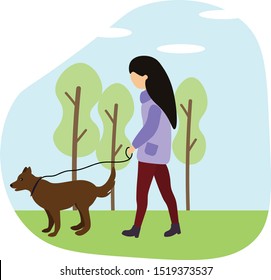 girl walks with a dog in spring