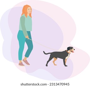 girl walks with a smile and leads a dog of the Entlebucher Sennenhund breed on a leash. The concept of friendship and love for animals