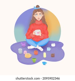 a girl in a warm fluffy red sweater with crossed legs sits on the floor and drinks a drink from a cup, there are many coffee and tea glasses nearby, a young woman with blue eyes sits on a carpet