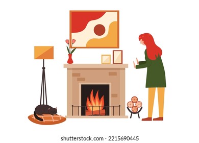 Girl warming hands up at fireplace