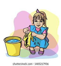 girl washes the floor with the rag in montessori school