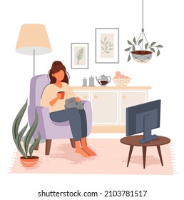 A girl watches TV while sitting on an armchair with a cat and a mug of tea. Vector illustration.