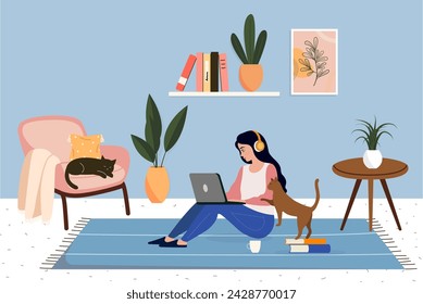 Girl wearing headphones in a home interior with cats working at the computer. Cat sleeps on a chair. Home interior design