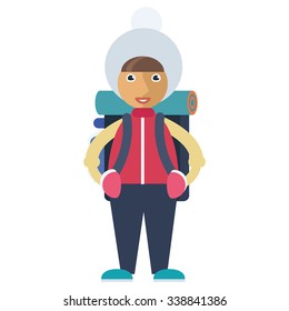 A girl in a winter hat carrying a backpack