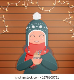 A girl with winter warm clothes holds a hot drink. Ready-made square card for a winter theme. Wooden background, garlands. Vector