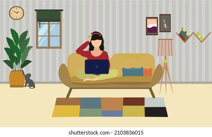 A girl is working at home. cat lover woman is working homeoffice with laptop. 