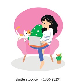 Girl working at home in the pink armchair with cat 