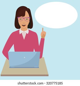 The girl works at the computer at his desk.