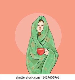 girl wrapped in a blanket drinking coffee