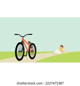 a girl in a yellow T-shirt and white trousers fell off her bike against the background of a green field, sits sad and angry