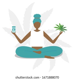 A girl in a yoga pose holds cannabis leaves and pills from this plant in her hands.