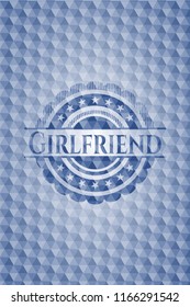 Girlfriend blue badge with geometric pattern background.