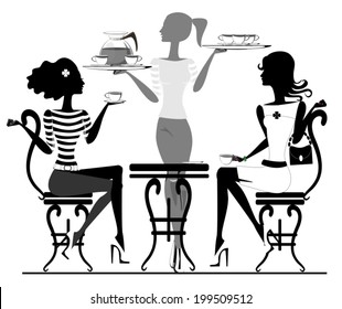 Girlfriends in a cafe with a cup of coffee