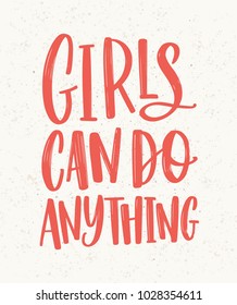 Girls Can Do Anything hand lettering written with red letters on light background. Inscription handwritten with elegant cursive font. Feminist or gender equality slogan, phrase. Vector illustration.