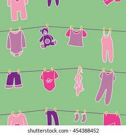 Girls' clothes and toys drying on the clothesline. Vector seamless pattern.