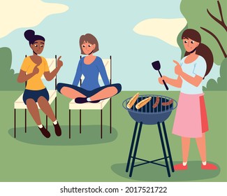 girls cooking in backyard outside