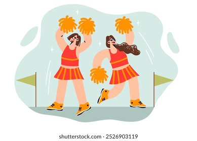 Girls dancers engage in cheerleading, motivating athletes to new records in sports competitions. Women with cheerleading pumpons on hands are dancing fiery dance enjoying attention of audience