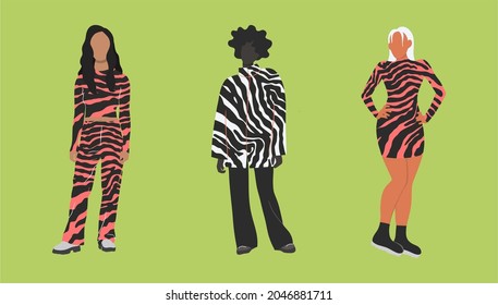 Girls dressed in fashionable clothes with tiger's dim. Collection of female cartoon characters isolated on green background. Colored illustration in a modern flat style.