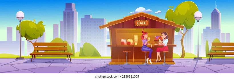 Girls drink coffee sitting in street cafe. Vector cartoon illustration of summer city park landscape with women in outdoor cafeteria, wooden benches, green trees and town on skyline