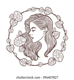 The girl's face in profile . Vector logo girl. The girl's face in a circular frame plant