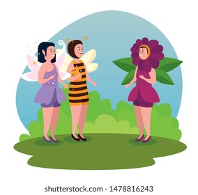girls fairies with wings and bushes plants