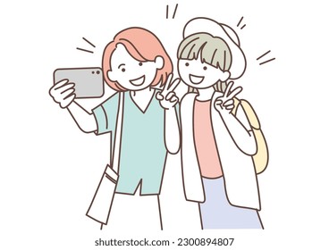 Girls having fun taking selfies