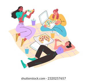 Girls in meadow on blanket eating pizza. Picnic, relaxing in nature