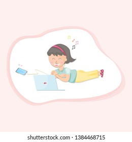 Girls play computer and listen to music happily.