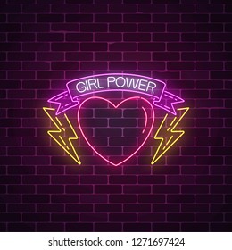 Girls power sign in neon style on dark brick wall background. Glowing symbol of female slogan in ribbon with heart and lightning shapes. Women rights. Vector illustration.