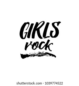 Girls rock. Positive feminism slogan. Black brush calligraphy on white background.