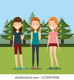 girls with smartphones in the camping zone