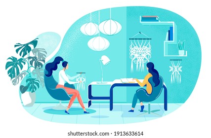 Girls Spend their Free Time doing Macrame Together. Girlfriends Weave Beautiful Patterns with Threads. One them is Looking at Diagram in Book. Finished Work is already Hanging on Wall.