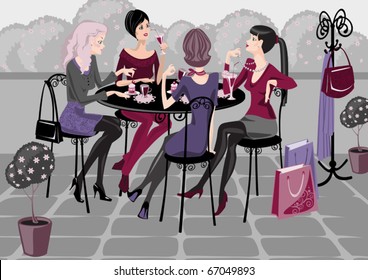 girls spend their time in a street cafe