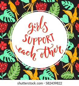 Girls support each other, Feminism quote handwritten on tropical background with parrots and palm leaves.