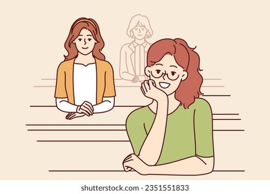 Girls university students sit in audience and listen to informative lectures to gain new knowledge on professional topics. Happy woman students enjoy studying at city college with amazing teachers