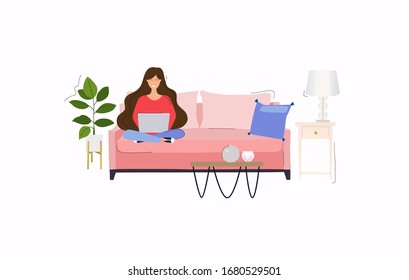 Girls working at home. Young woman sitting on a sofa and using laptop. Freelance, self employed, freedom, in living room.