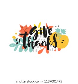 Give thanks calligraphy text decorated with fall leaves. Vector modern style autumn lettering