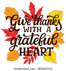 Give thanks with a grateful heart. Hand lettering quote with fall leaves. Thanksgiving vector typography for posters, cards, home decorations