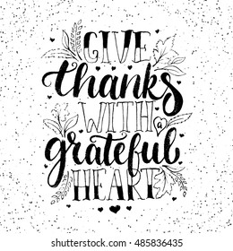 Give thanks with a grateful heart - Thanksgiving day lettering calligraphy phrase. Autumn greeting card isolated on the white background.